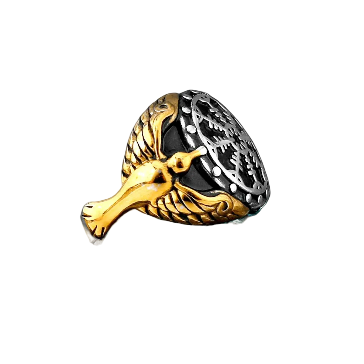 Gold and silver ring with intricate design on a black background