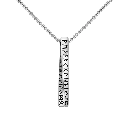 Silver necklace with a pendant featuring engraved symbols on a white background